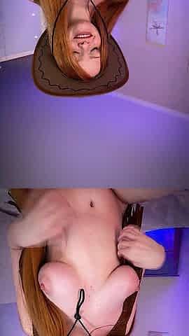 Redhead cowgirl gives u a wild ride topless