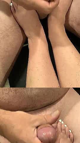 Angel massages his balls with her feet until that guy cums