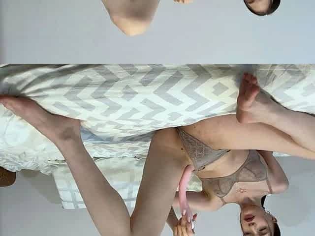 Slim Asian Babe Masturbates with Pink Dildo on Bedroom Bed