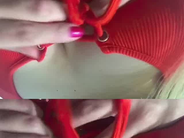 Carlycurvy in constricted orange short costume