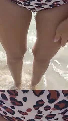 Bikini wetting on the beach