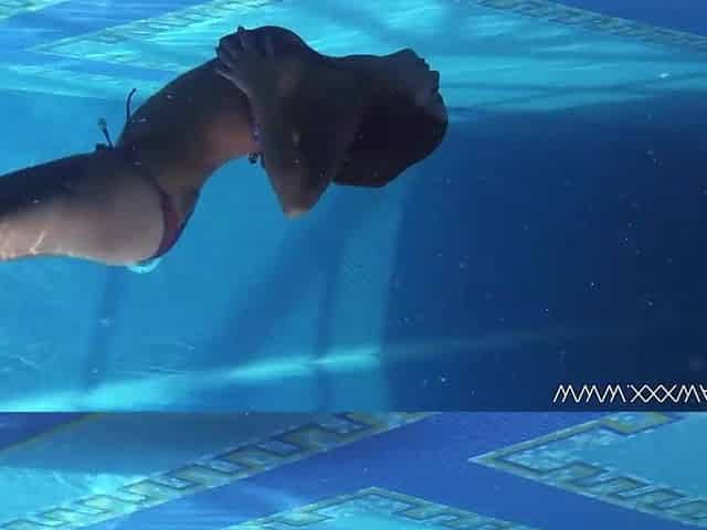 Heidi submerges herself in to the sexy pool