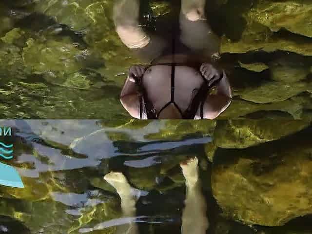 pretty blond is seen swimming alone in nature's garb and warms up facial in the face