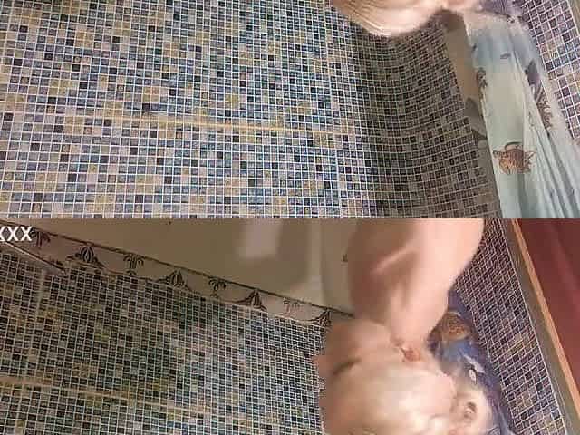 A short dude licks and bangs a much taller, slim, aged amateur in the washroom