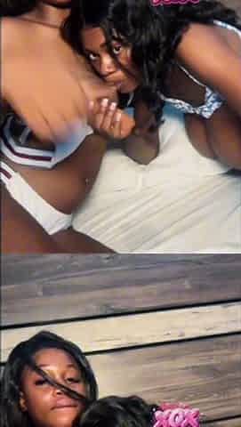 Nice-looking large tit Afro sisters Asari XOX and Skyla Koko lick every other's cunts