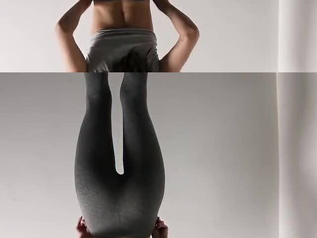 Fitness girl in leggings masturbating near the wall.