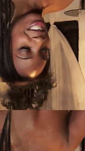 Two oiled up ebonies fucking with big strapon