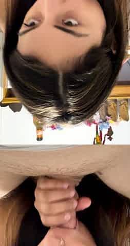 Tan stud gives a POV blowjob to his big cock