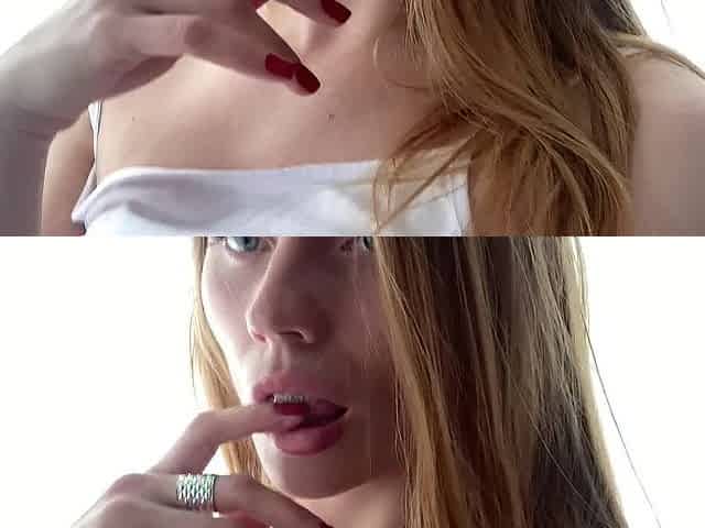 Gorgeous gal licking her fingers.