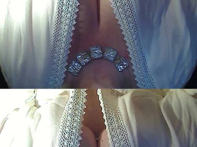 Mature lady shows her giant boobs on camera
