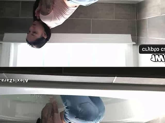Alexis Zara desfruta de uma brincadeira sensual no banho com denim molhado.