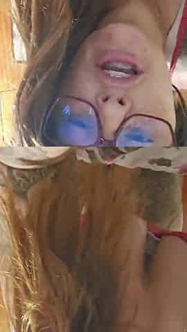 Redheaded married woman makes a episode call with a fan and shows her snatch.
