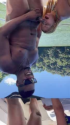 Large-dicked ebony dude drilled a married nymph's little butt on a boat and her spouse recorded anything.