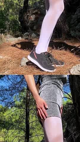 White oil shiny pantyhose in mountain forest