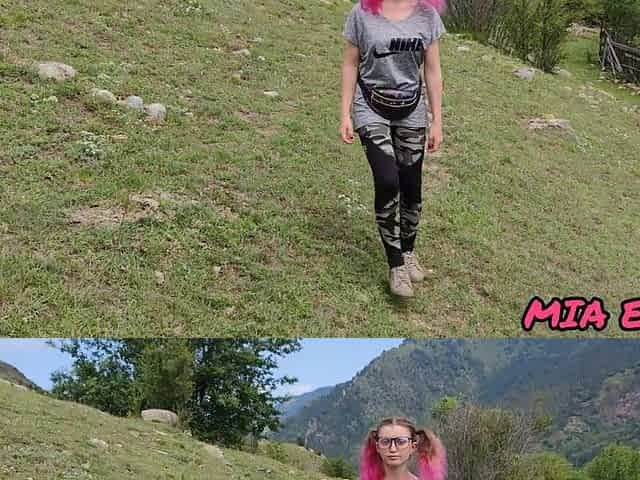 hotty with pink tips walks in nature in the mountains attracting attention to herself