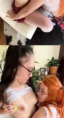 Redhead and brunette lesbians make out
