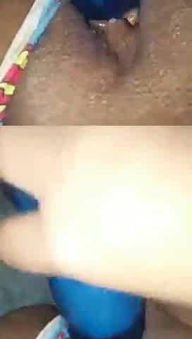 Black using sex-toy in her twat
