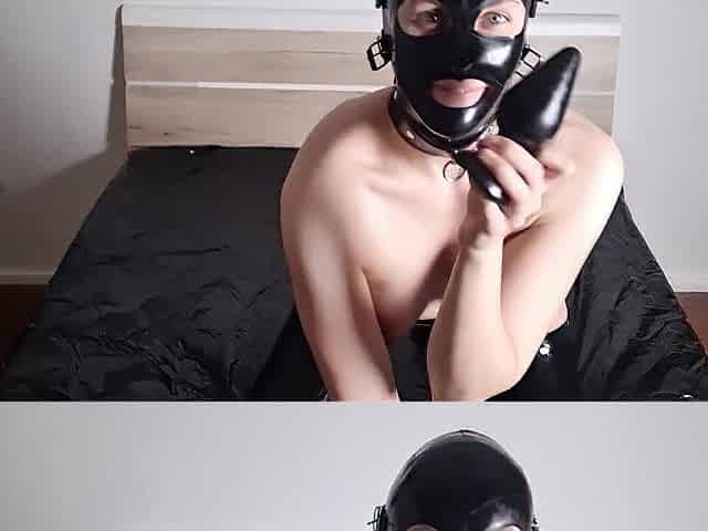Latex whore enjoys 6 cm buttplug in her booty.