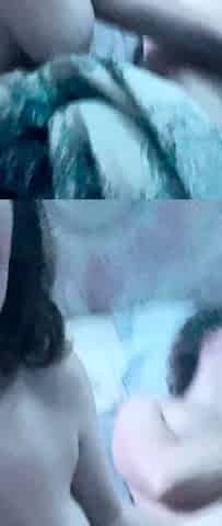 A super sexy brunette massages her big boobs