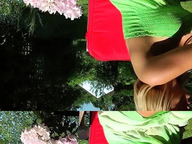 Blonde is flashing her big boobs in the outdoors
