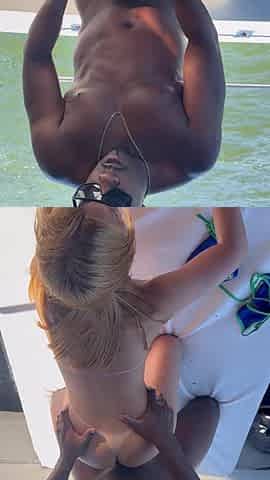 Large-dicked ebony chap banged a married nymph's little booty on a boat and her spouse recorded anything.