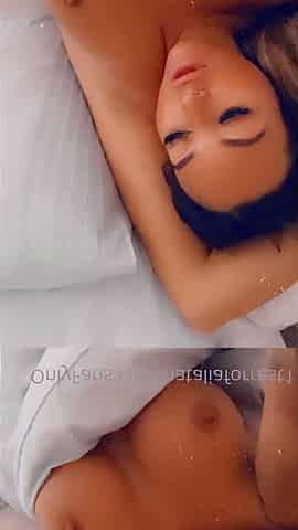 Busty curly brunette with big boobs fucks on couch