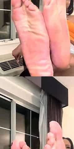 MILF in fishnet enjoys foot fetish