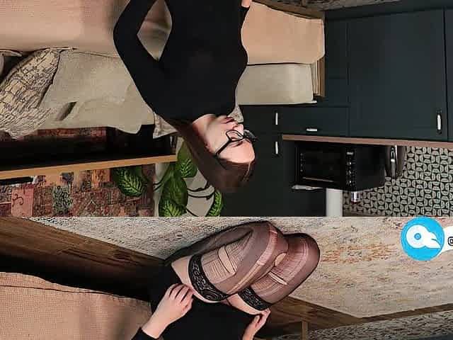 Eliz Masturbating and Sucking a Vibrator Whilst Wearing an Elegant Ebony Costume and Tights