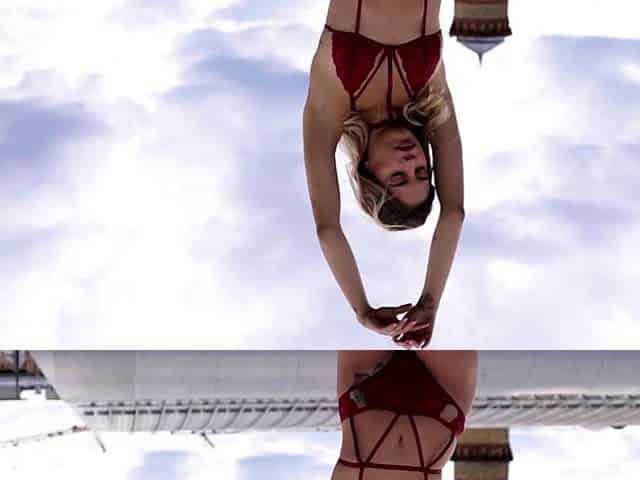 Blonde latina poses naked at the rooftop