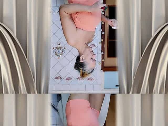 Elderly Housewife Lukerya in the Kitchen. Cheerful Flirtation