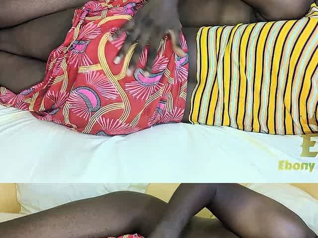 A youthful Afro cleaning woman appears to be relaxed about being drilled by her boss.