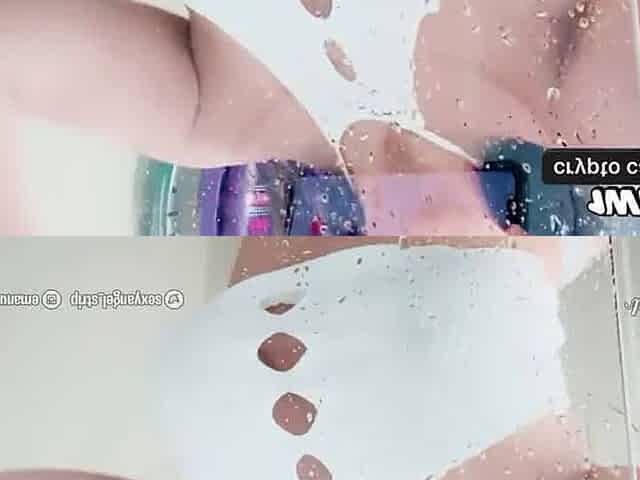 Sexy latina teasing in the shower big bootie and enormous melons against the glass humid t-shirt