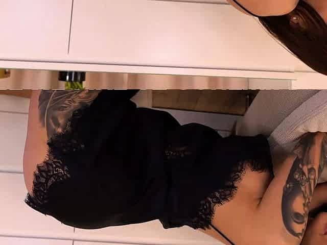 Tattooed Hottie in Lingerie Teases with Dildo and Butt Plug