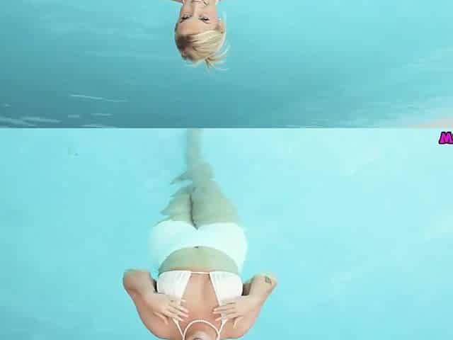 Voluptuous Irich Essie Flashed Her Large Breasts Whilst In The Pool
