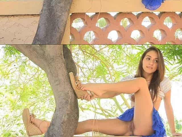 Sweet girl Sara flashes her shaved coochie outdoors