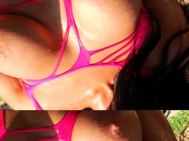 A super sexy brunette massages her big boobs