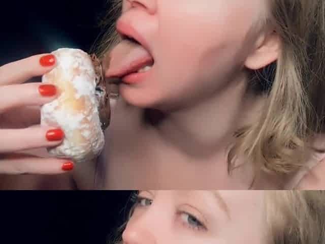 Large Breasted Camgirl Eating a Donut Like It's Vagina