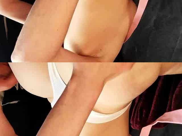 Busty babe playing with her big boobs