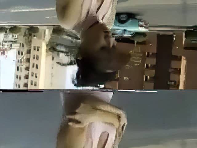 Oriental woman pooping her hose in public