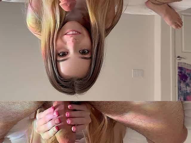 Molly Little uses her feet on a large shlong