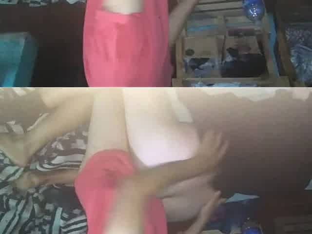 Boy in a Red Shirt Pulls up His Black Dress