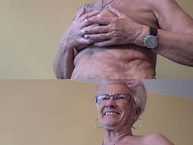 Tattooed granny exposes her big clit for your pleasure