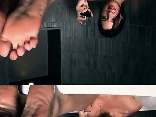 Brunette with foot fetish rubs big dick with her feet in POV