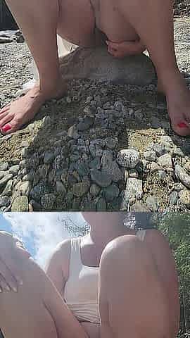 Wife pissing on a public beach