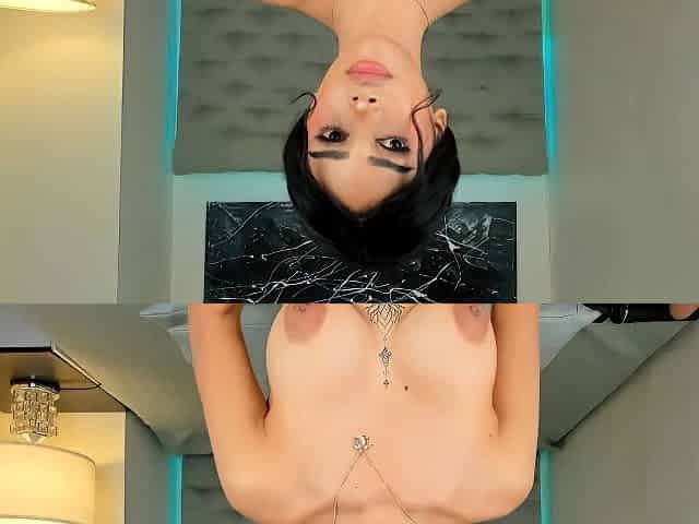 Busty babe playing with her big boobs