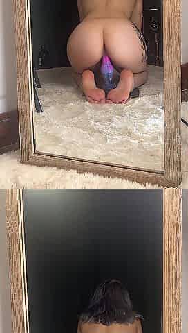 Mirror view from behind , vibrator in twat , butt and feet visible