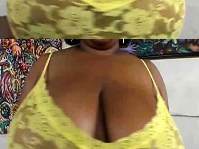 Pink Kandi is a big black woman masturbating