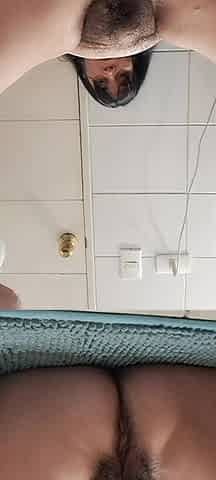Stepmother in the Bathroom Silently Reaching Orgasm