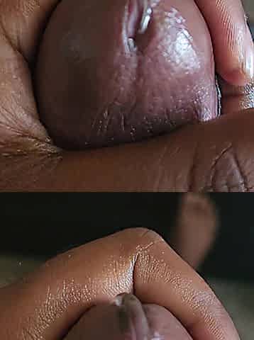 Ebony cock being stroked gently