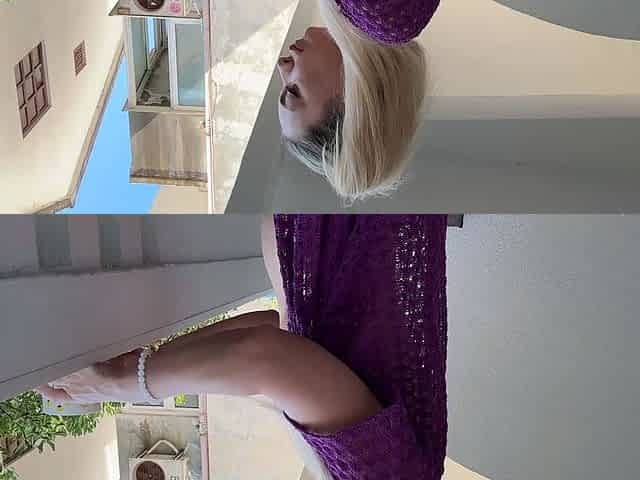 Blonde beauty naked on the balcony